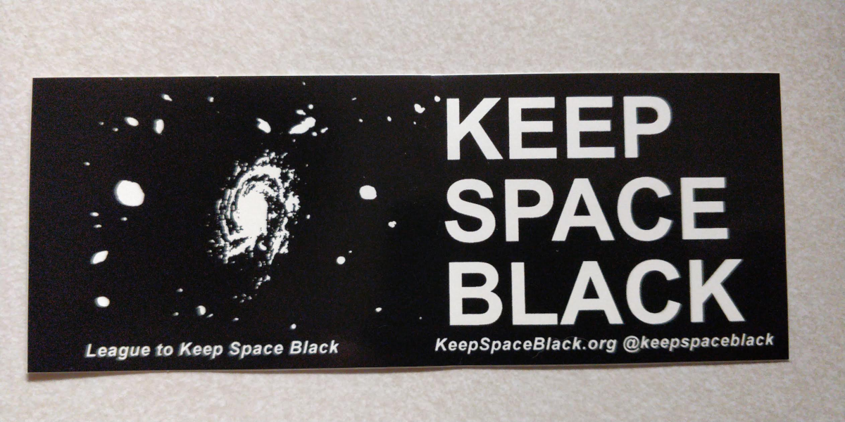 swirling galaxy sticker with Keep Space Black emblazoned